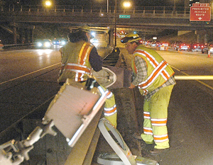 Photo of crew working at night on I-94.